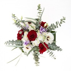 From the perspective of a Gideapark floral artisan, this meticulously composed bouquet radiates a sense of thoughtful harmony-every detail evokes the tranquillity and warmth felt at the heart of the community. Deep crimson roses take center stage, their lushness offset by starkly beautiful white gerberas, each flower assembled with care. Wispy sprays of lavender lisianthus offer contemporary flair, the effect reminiscent of dusk settling gently over Raphael Park. Soft, cloud-like clusters of small white flowers punctuate the arrangement, balancing the depth of colour and adding tactile softness. Silvered eucalyptus foliage thrusts upward and outward, its clean fragrance mingling with the subtle perfume emanating from the roses. At the base, sleek, dark green leaves encircle the bouquet, perfectly framing the clear stems submerged in sparkling water within a pristine glass vase. This abundance of fresh blooms, arranged with expertise by a Gideapark florist, encapsulates the artistry and heart of local gifting. It is ideal for commemorating special milestones, welcoming loved ones to new homes, or simply brightening everyday moments with soulful beauty.